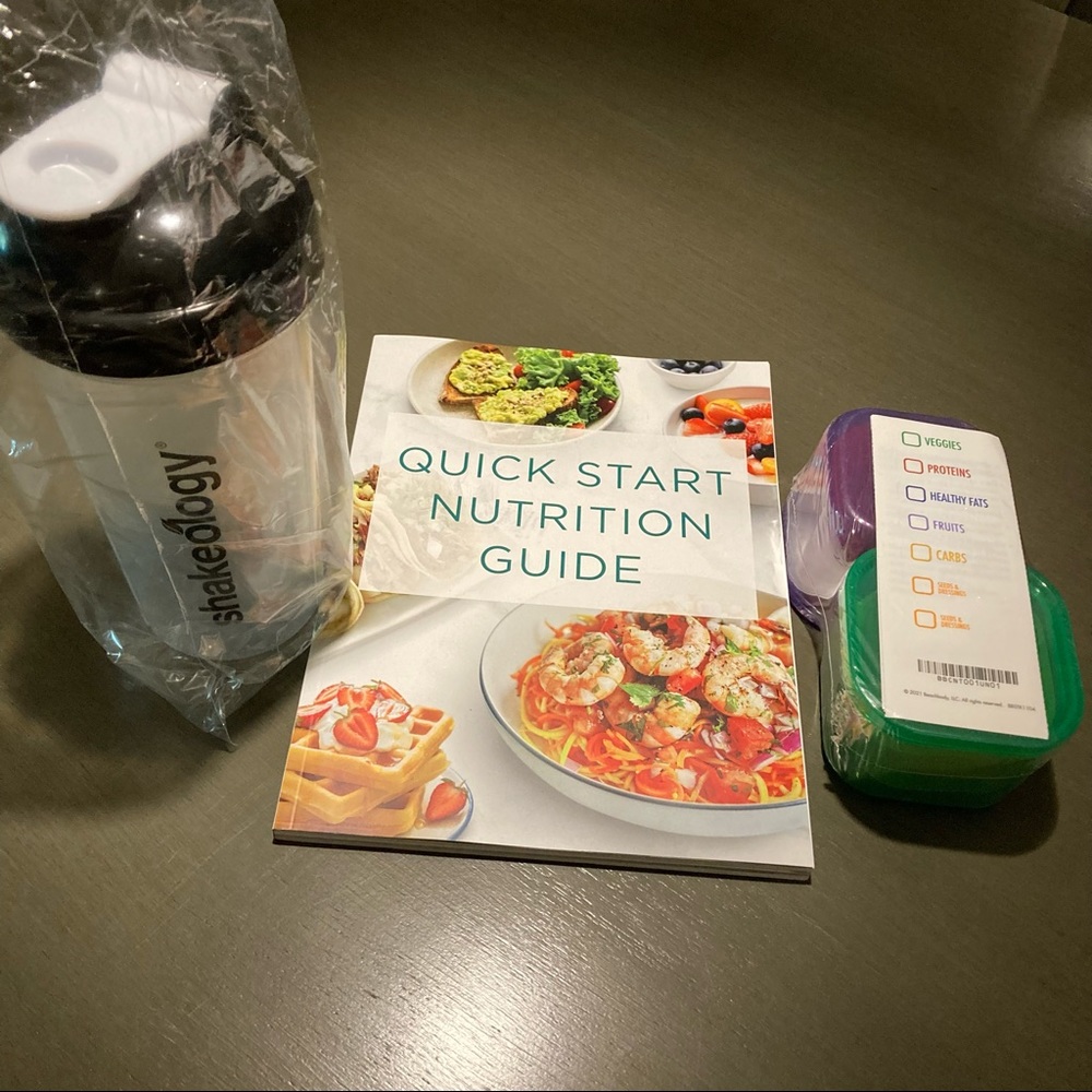 BeachBody containers, shaker cup, and nutrition guide